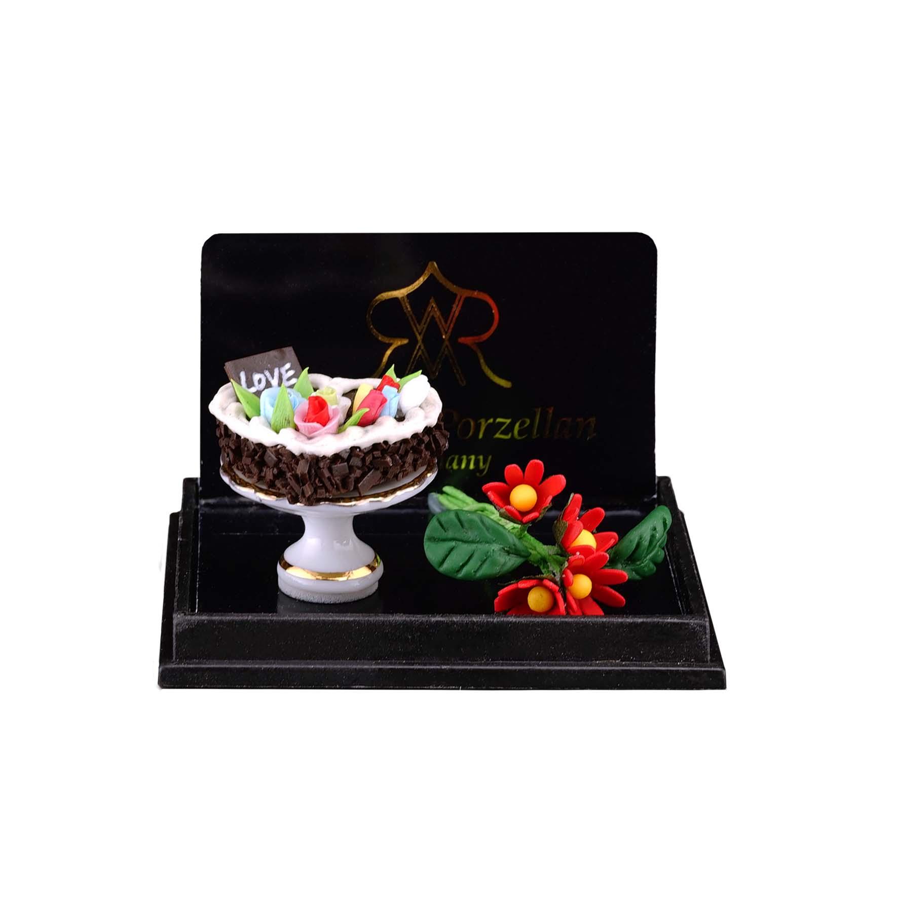 Valentinstag mit Herzkuchen und Blumen