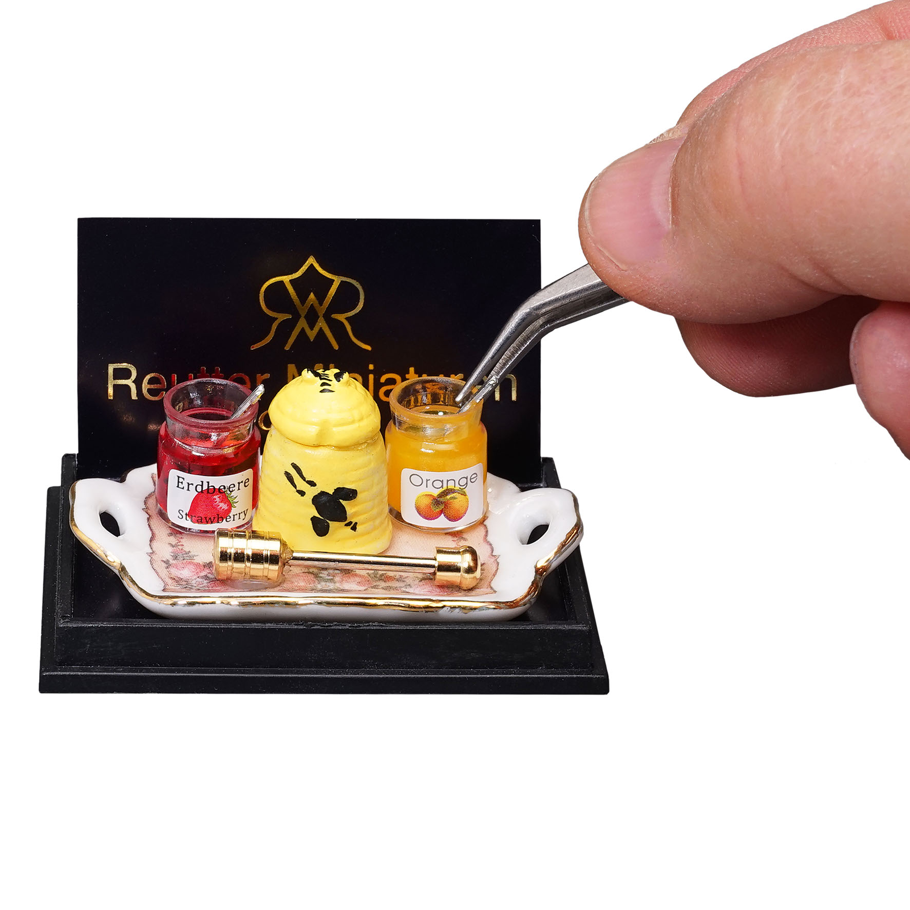 Honigfrühstück mit goldenem Honiglöffel