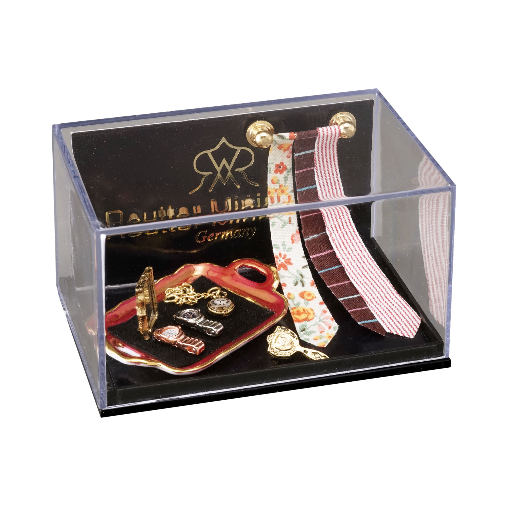 Krawattenhalter mit 3 Krawatten, Taschen- und Armbanduhr sowie Spiegel und Bürste