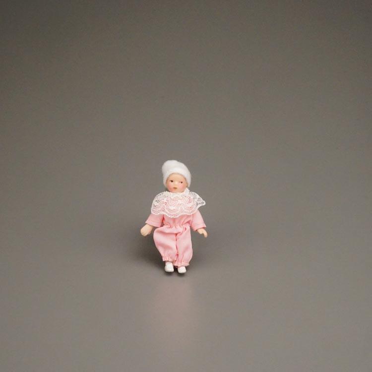 Babyfigur mit Porzellankopf
