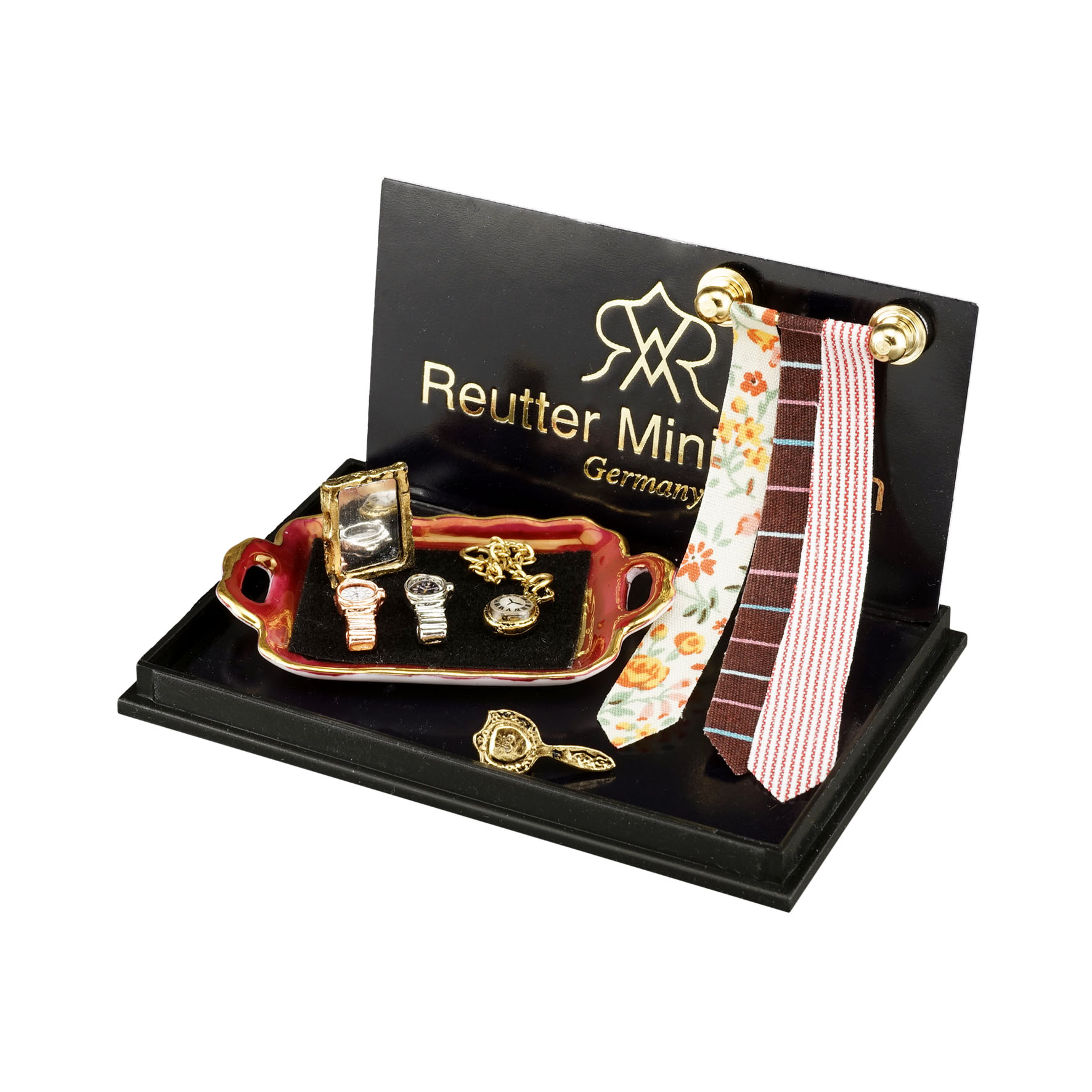 Krawattenhalter mit 3 Krawatten, Taschen- und Armbanduhr sowie Spiegel und Bürste