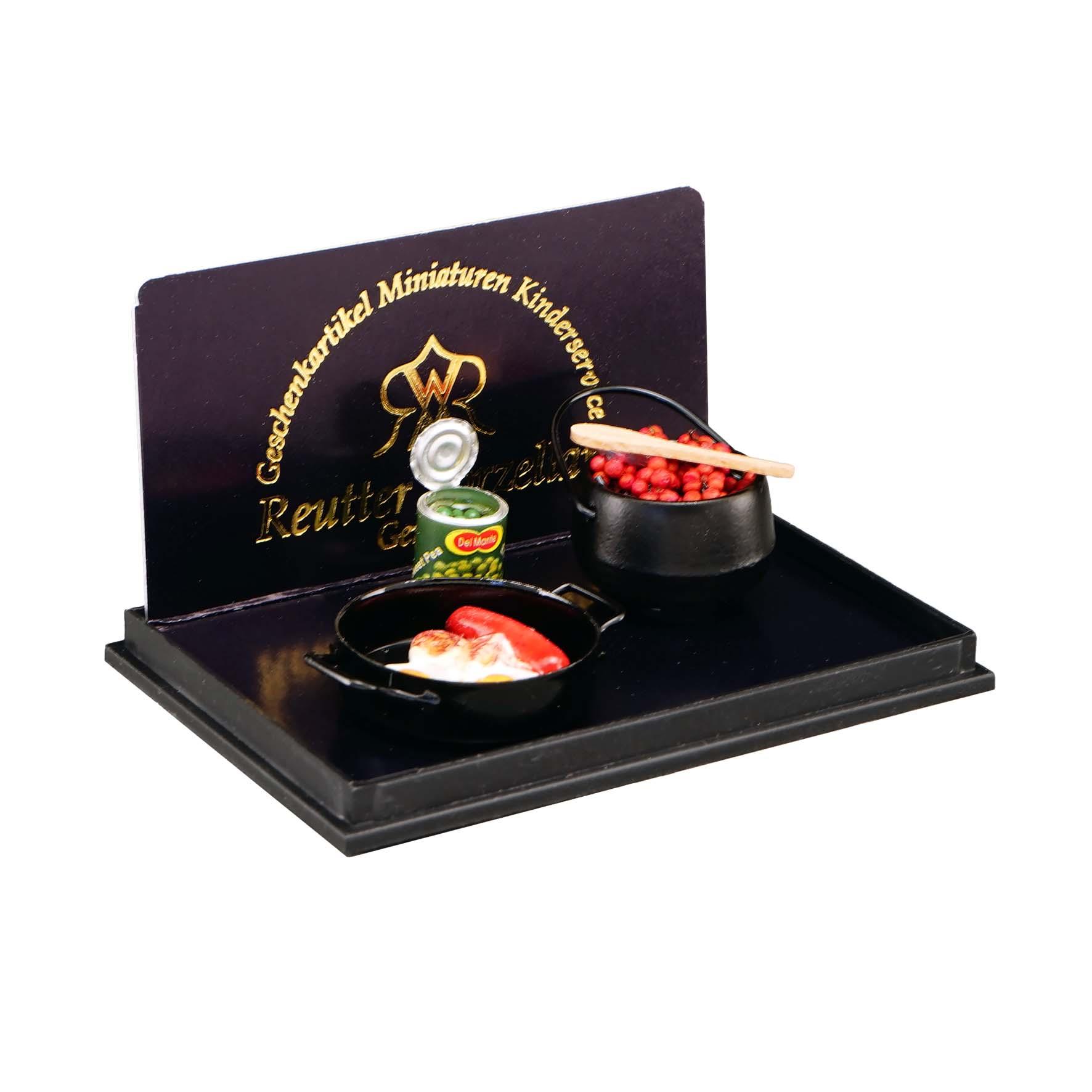 Rustikales Kochen mit Bohnen, Spiegelei und Wurst