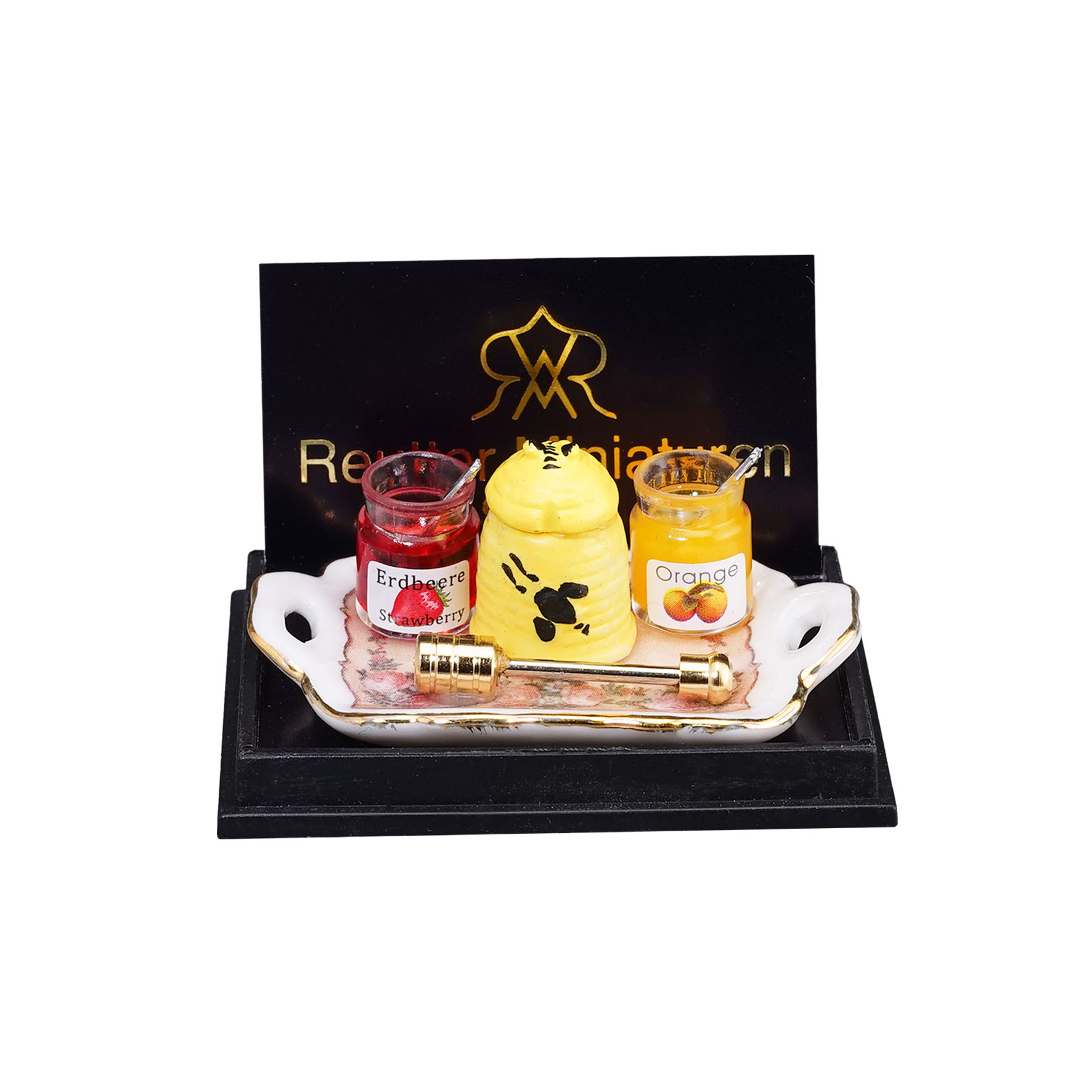 Honigfrühstück mit goldenem Honiglöffel