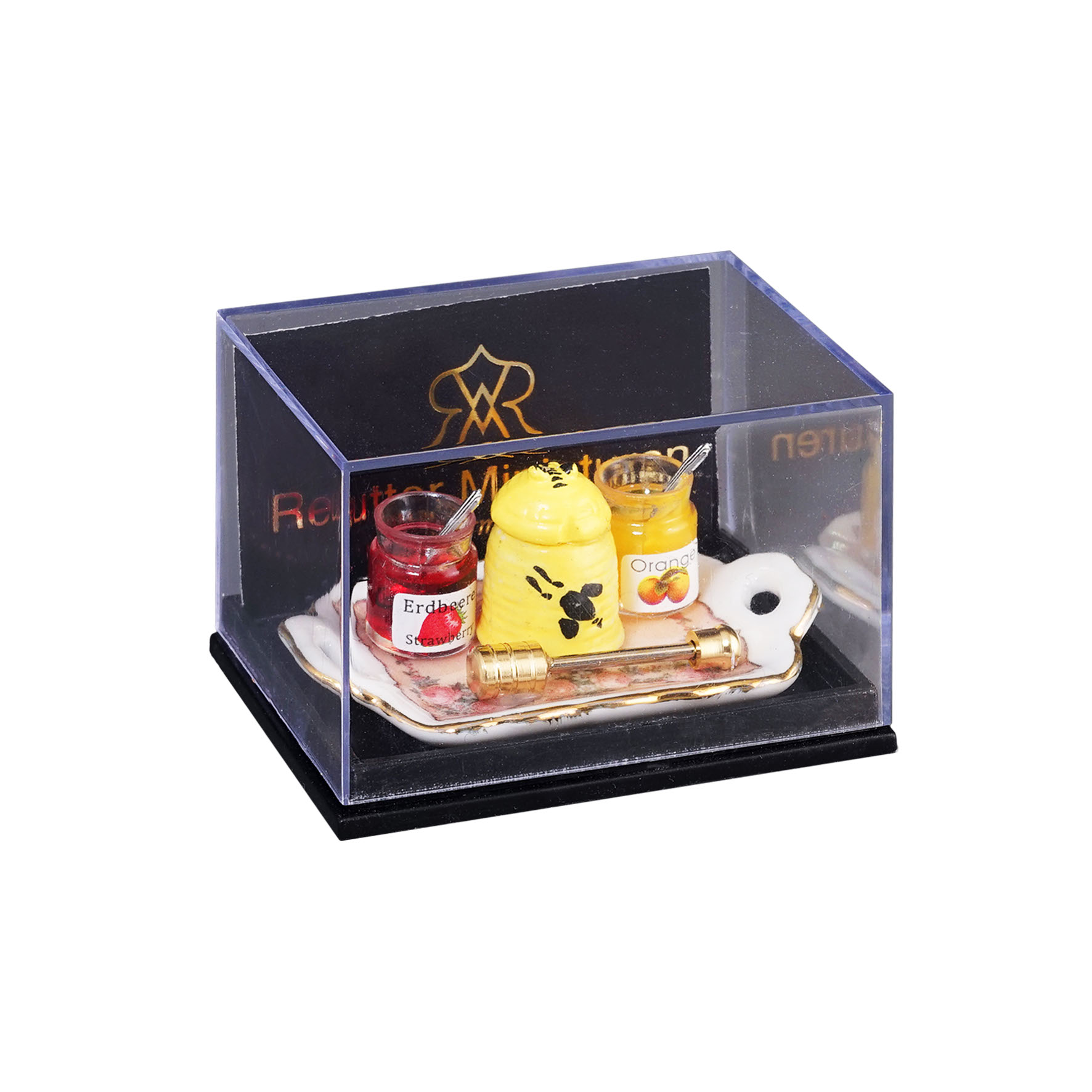 Honigfrühstück mit goldenem Honiglöffel