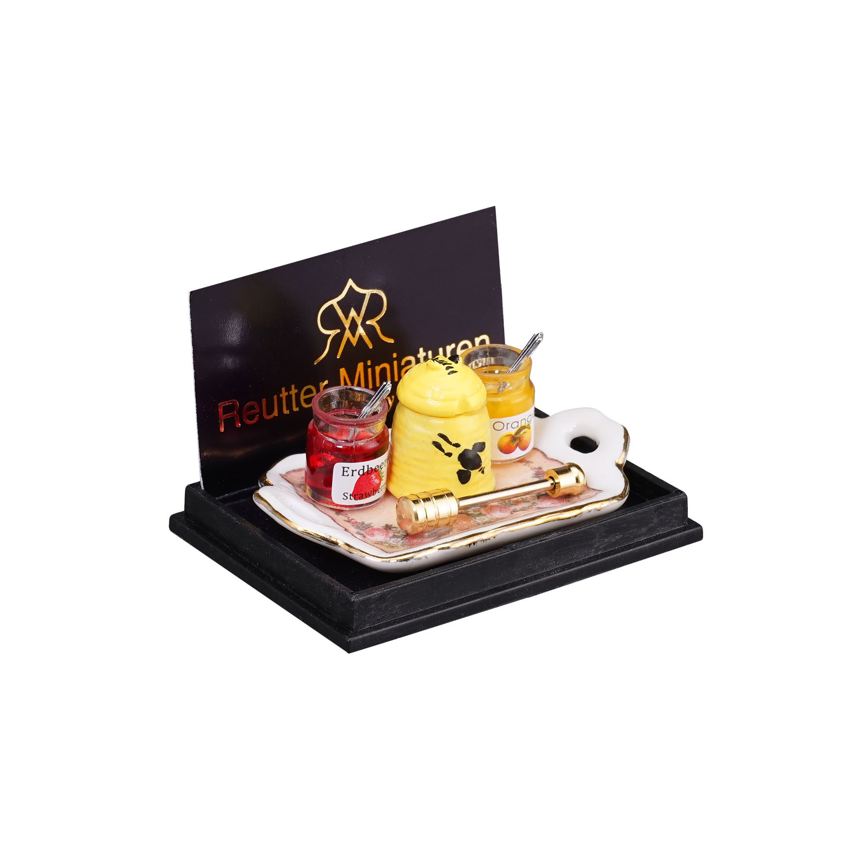 Honigfrühstück mit goldenem Honiglöffel