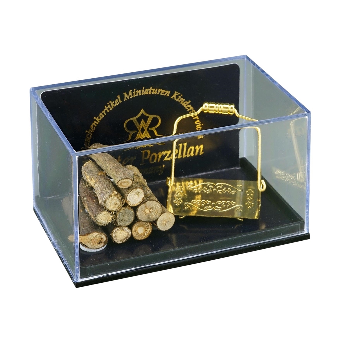 Kaminholz mit goldenem, schön verzierten Holzsammler