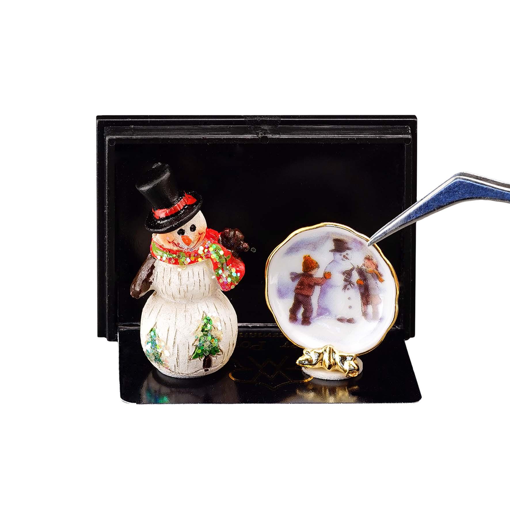 Kleiner Schneemann mit Teller