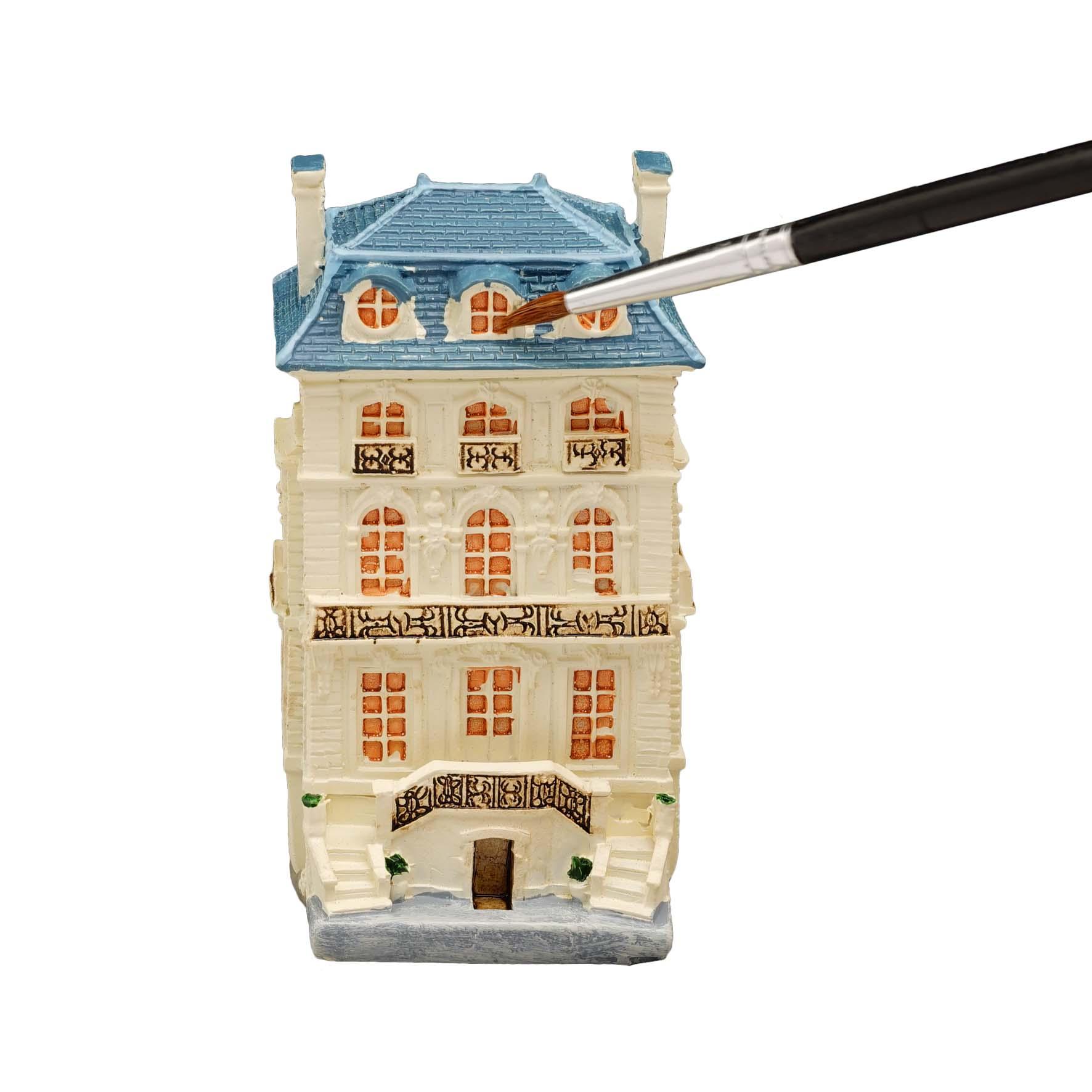 Puppenhaus mit blauem Dach